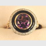 Onyx Ring | Period: New | Material: 9ct. gold, onyx, amethyst and diamond.