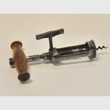 Mechanical Cork Screw | Period: Edwardian c1910 | Material: Nickel plated steel and timber handle.
