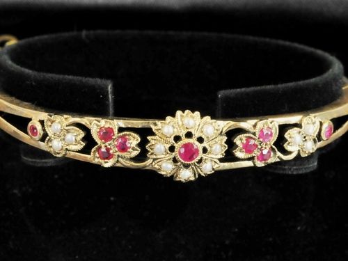 Ruby & Pearl Bangle | Period: New | Material: 9ct. gold set with rubies and pearls.
