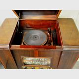 Sky Raider Radiogram | Period: c1950 | Make: Reliance Radio Co (A/sia). | Material: Walnut veneer cabinet