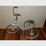 Child's Tricycle | Period: Vintage | Material: Steel & Tin; Solid rubber tyres | Tricycle - note pedals drive rear wheels not front wheel as is usual